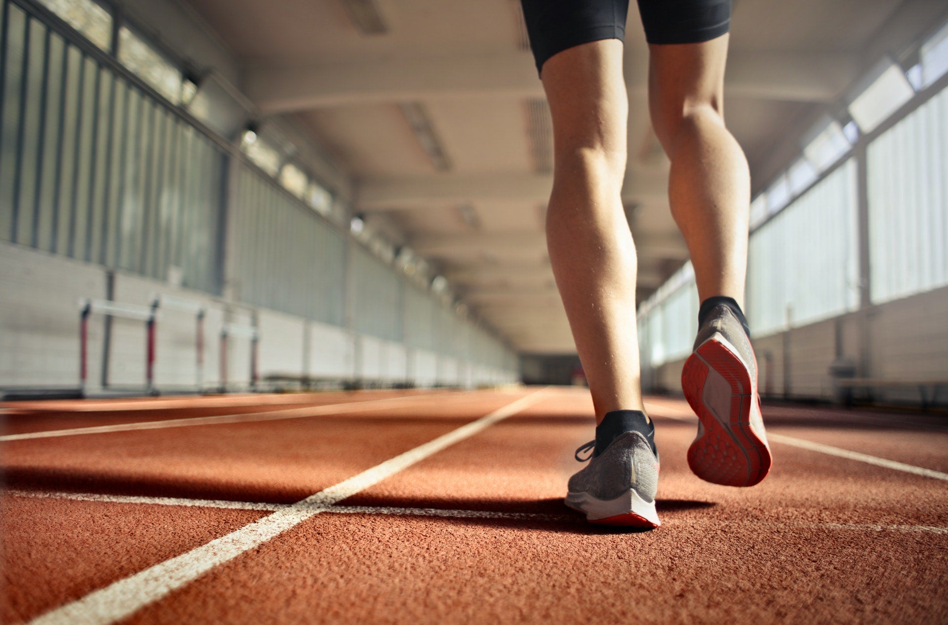 Man running on track Photo by Andrea Piacquadio from Pexels