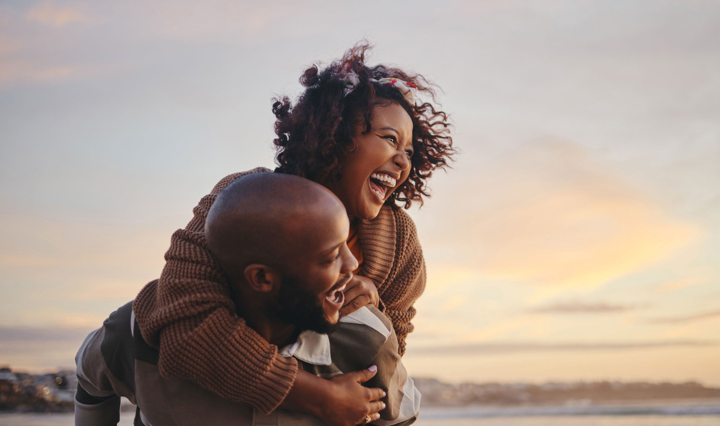 A couple enjoying life after using the NuroKor Lifetech devices to manage pain